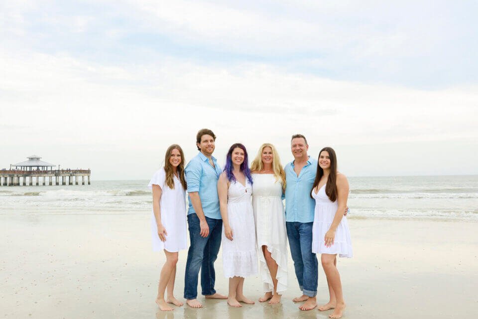 Happy family on the Naples beach - photo by Katrina Photography