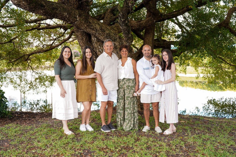 Big happy family under the tree - photo by Katrina Photography