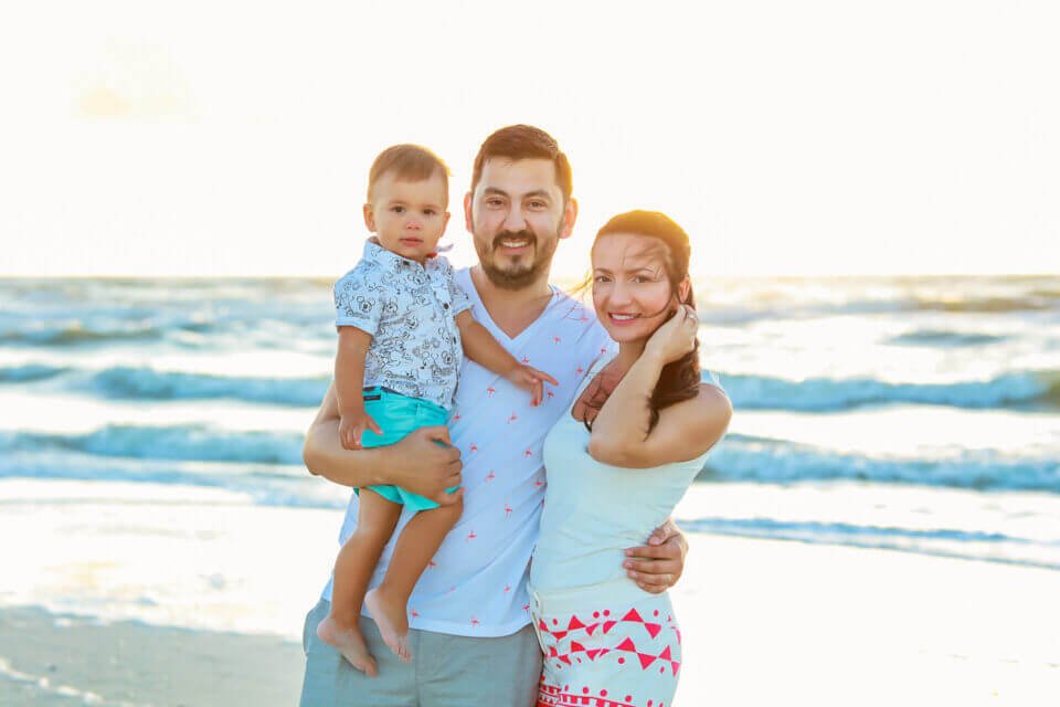 Photo of a happy young family - photo by Katrina Photography
