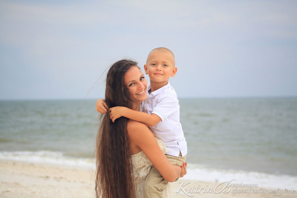 Mom and son on Naples beach, photo by Katrina Photography